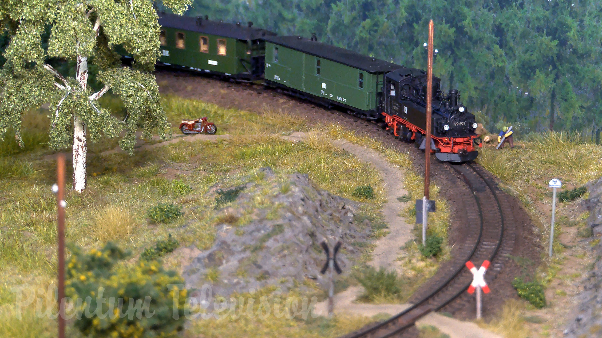 Beautiful model railroad of steam locomotives and steam trains used in East Germany (Saxon IV K)